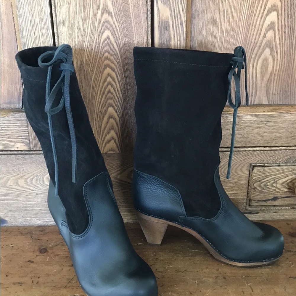 Very cool black clog boots. Size 42